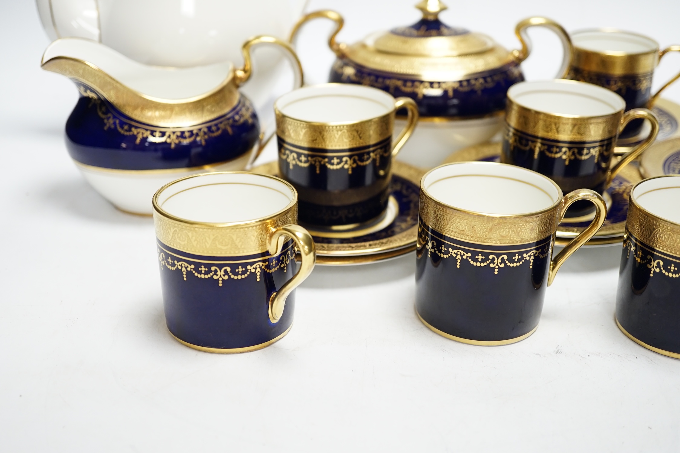 An Aynsley 'Georgian Cobalt' eight place setting coffee service (one coffee cup missing)